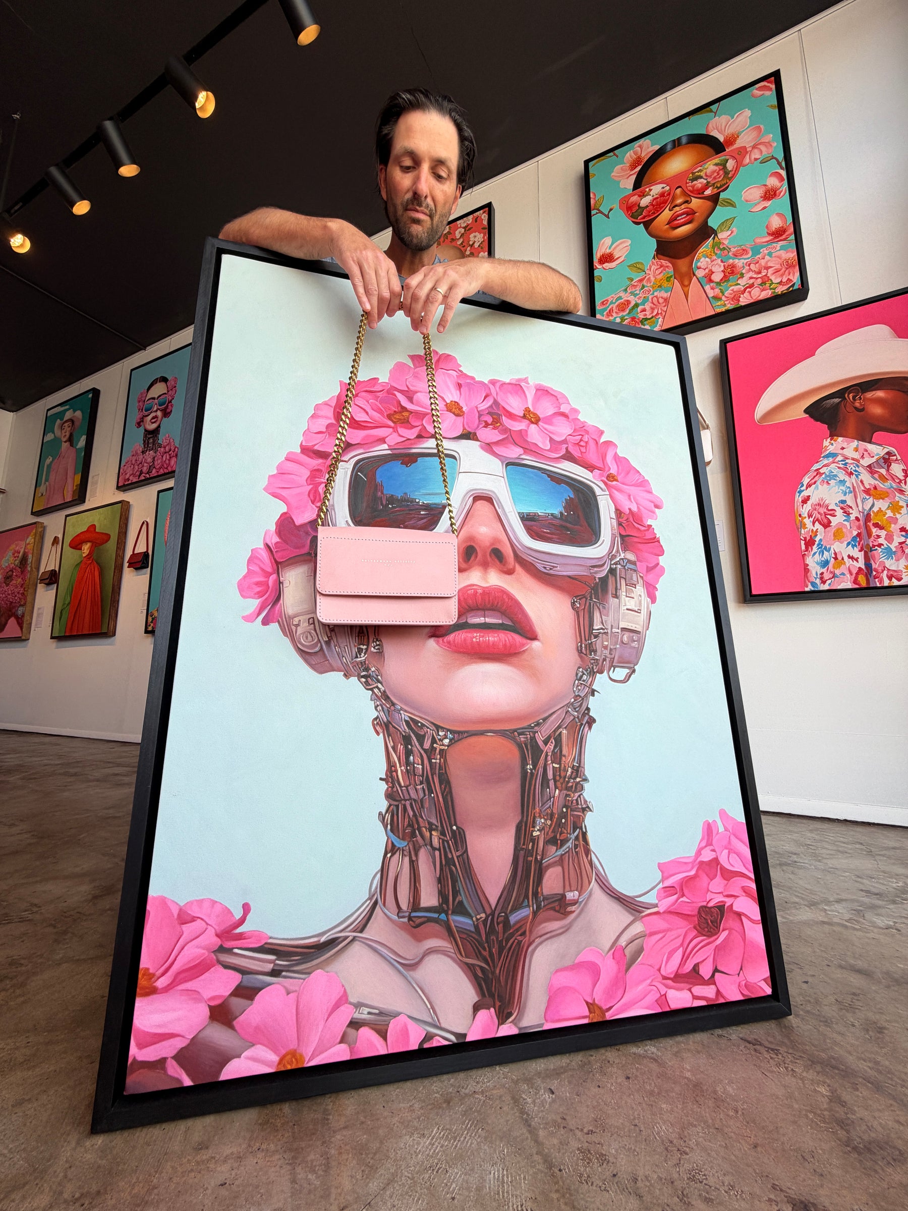 Seth holding Pink SS26 Le Mépris clutch