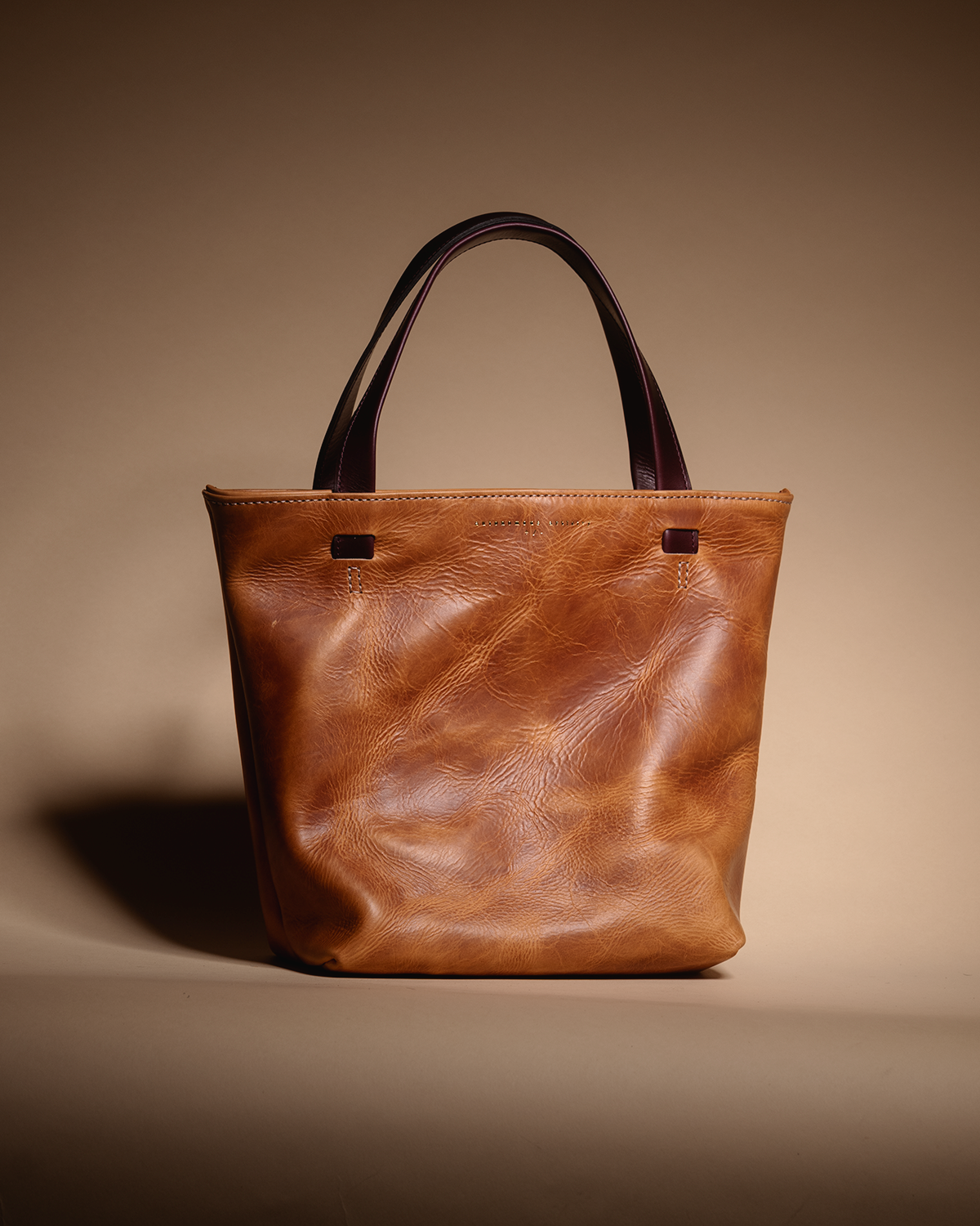 "The REVEL" tan