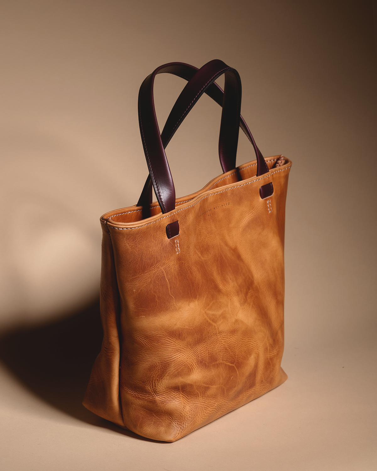 "The REVEL" tan