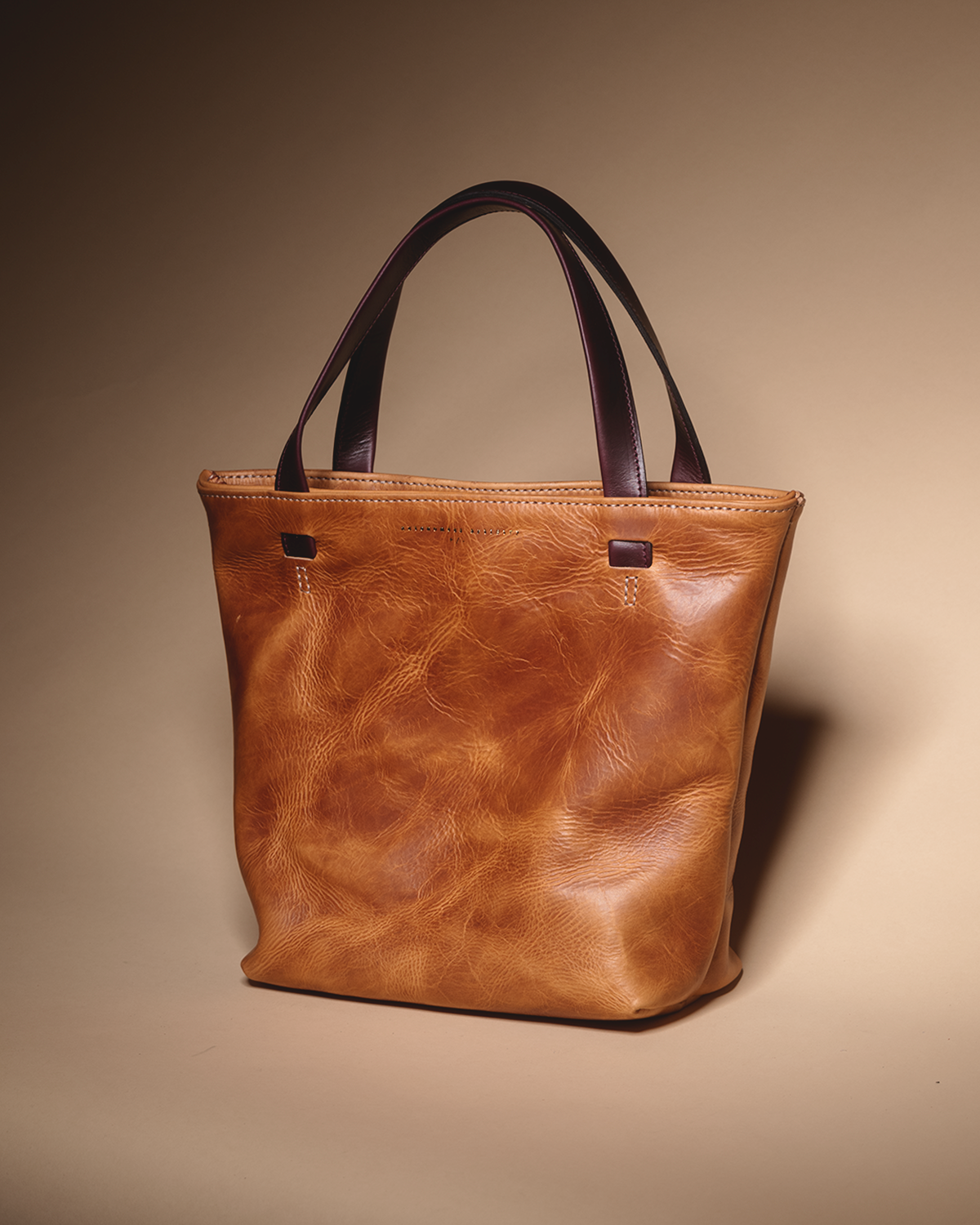 "The REVEL" tan