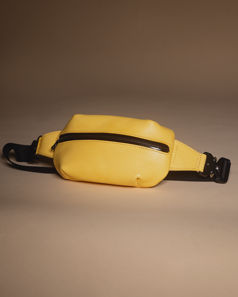 The "+/-" crossbody sling