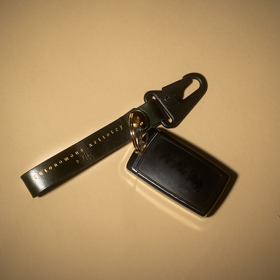 "+/-" key chain