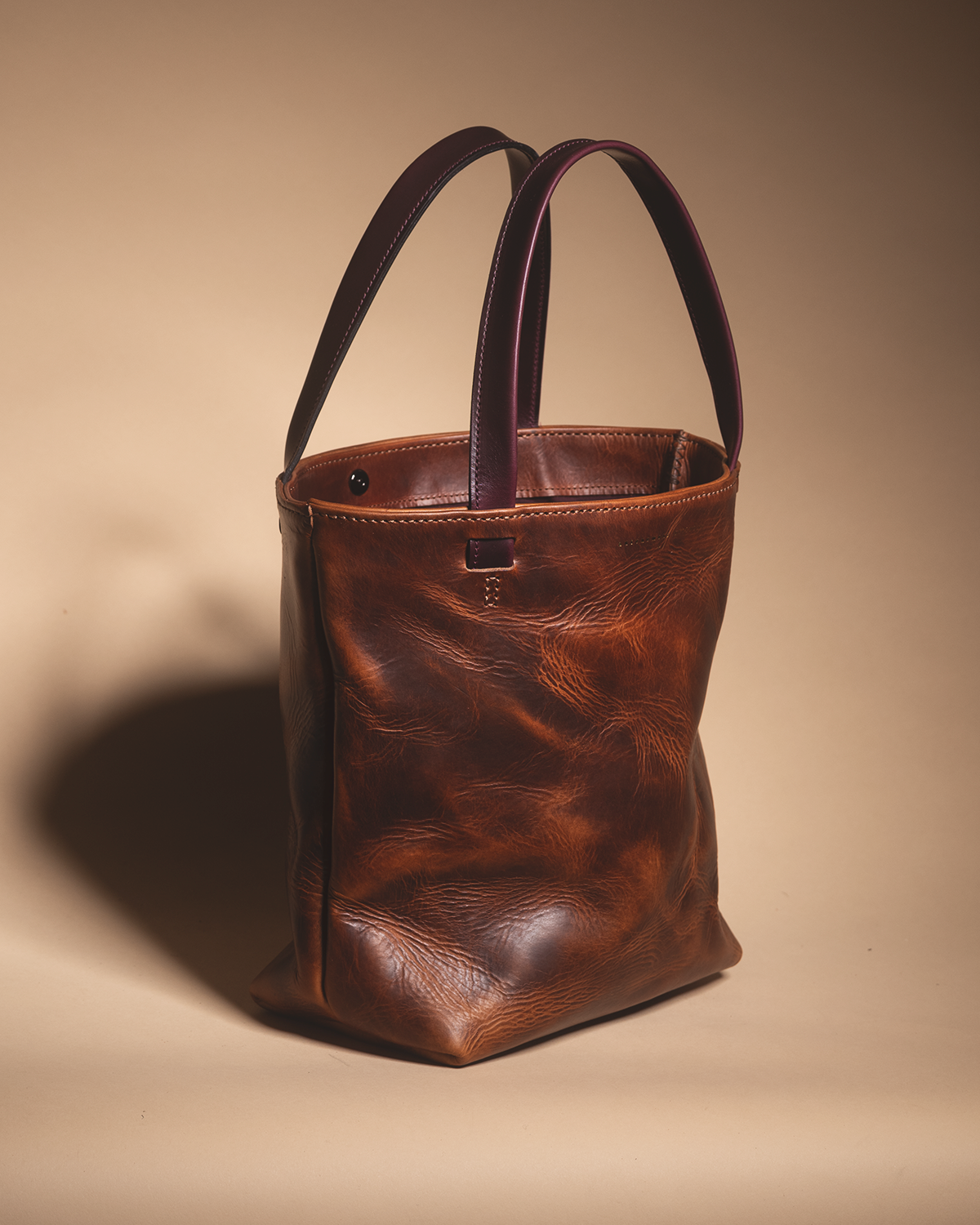"the REVEL" brown