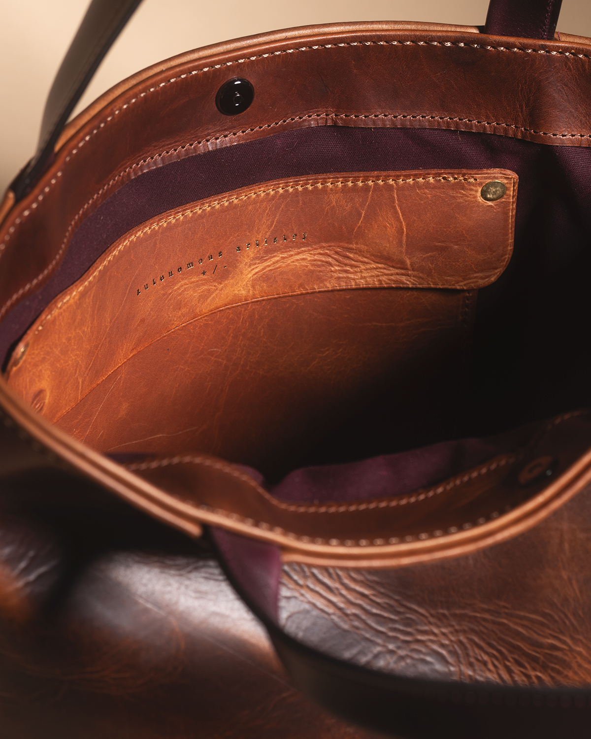 "the REVEL" brown
