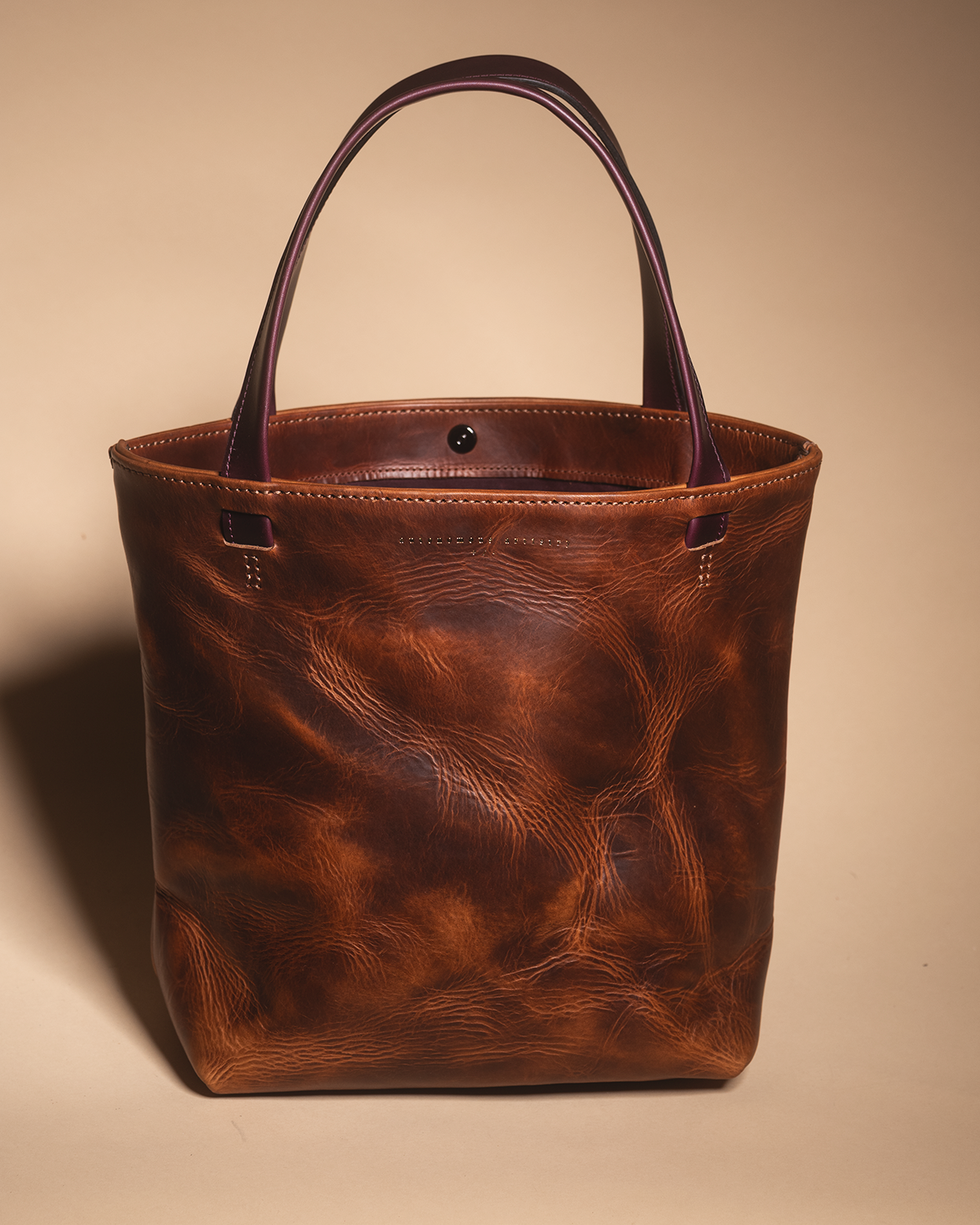 "the REVEL" brown