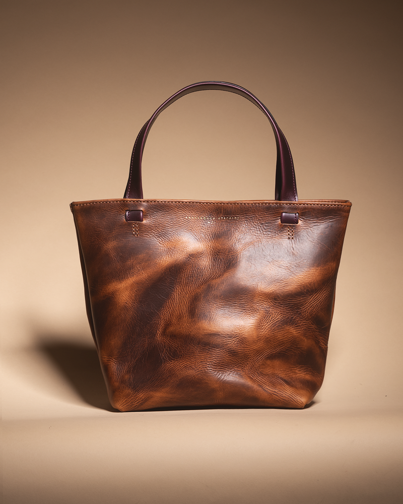 "the REVEL" brown
